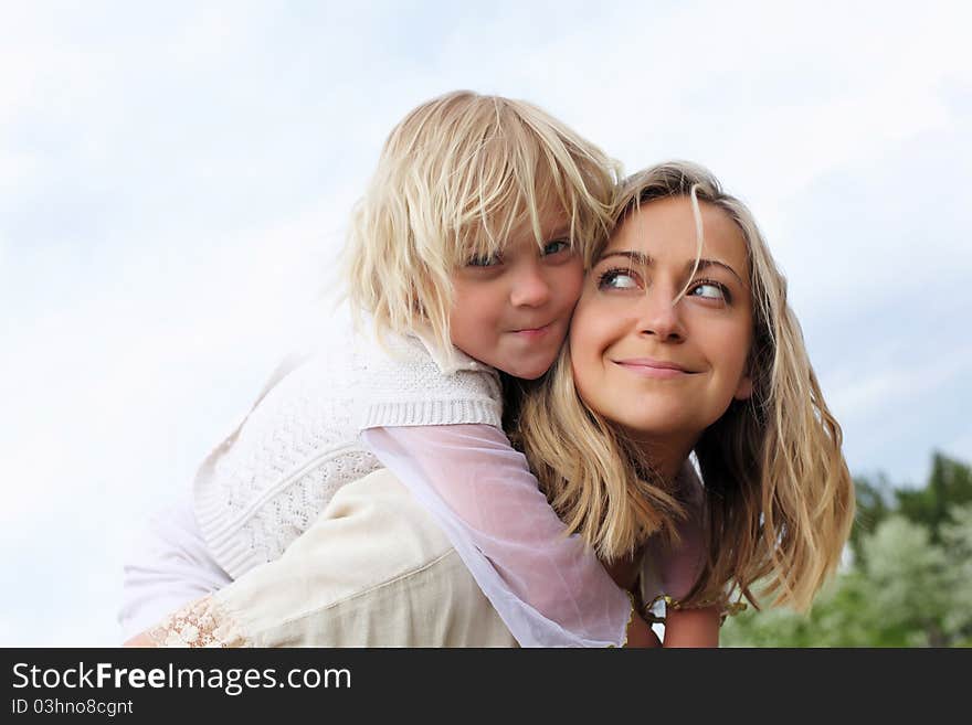 Girl with mother in the park