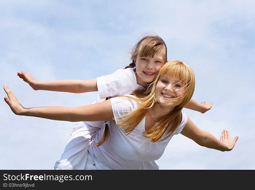 Girl with mother in spring park