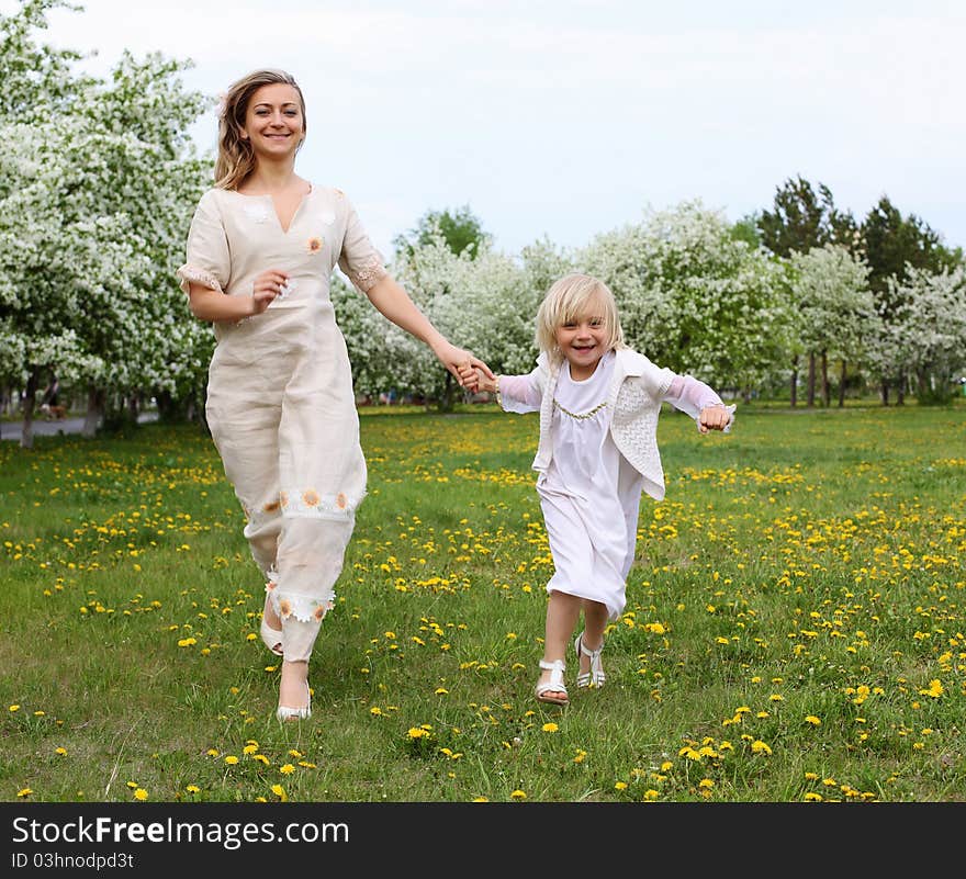 Girl with mother in the park