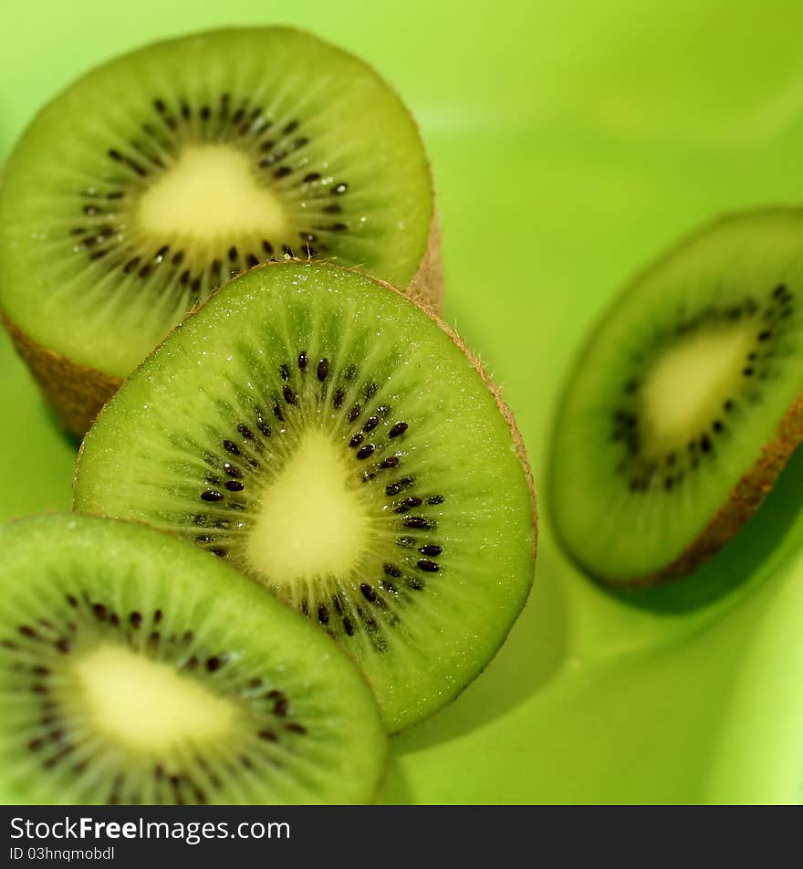 Kiwi on green background