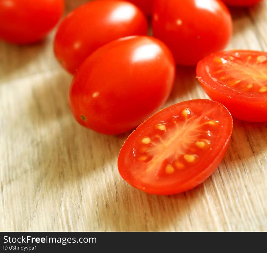 Fresh tomatoes on wooden table