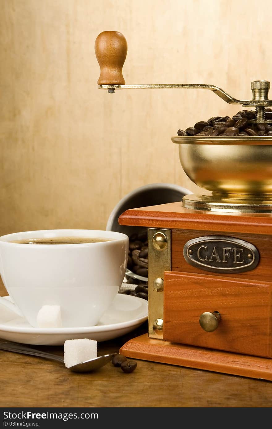 Cup Full Of Coffee, Beans, Pot And Grinder