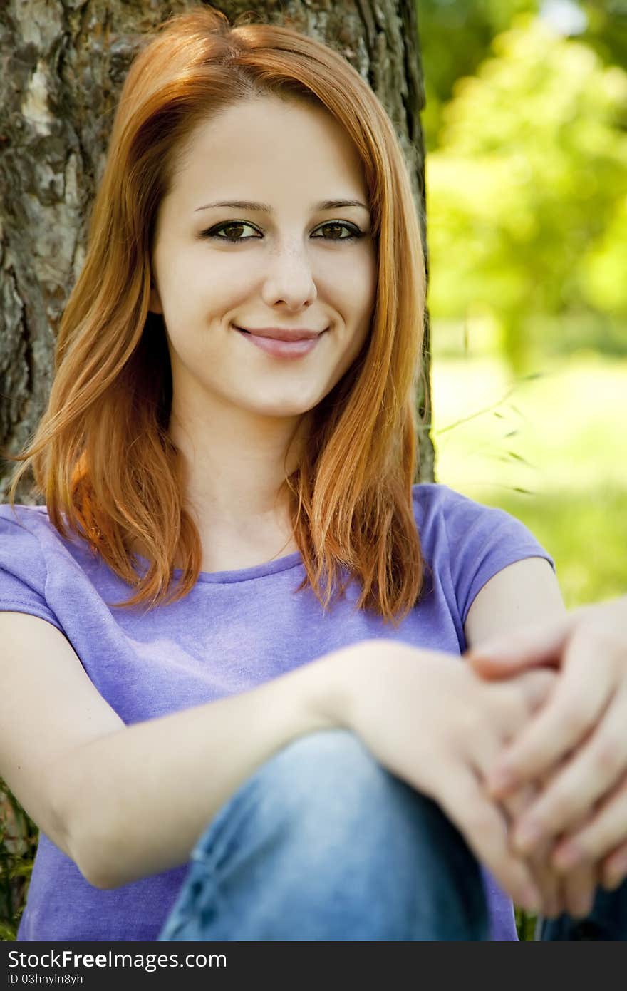 Girl at the park in summer time.