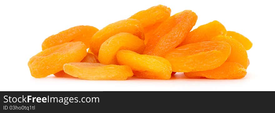 Pile of dried apricots over white background