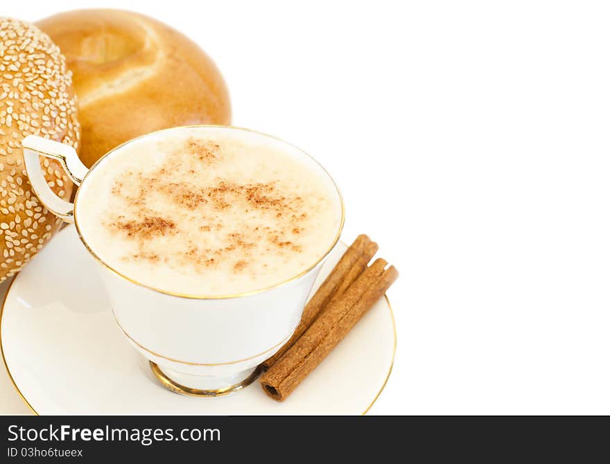 Cup Of Coffee And Bagels Isolated On White