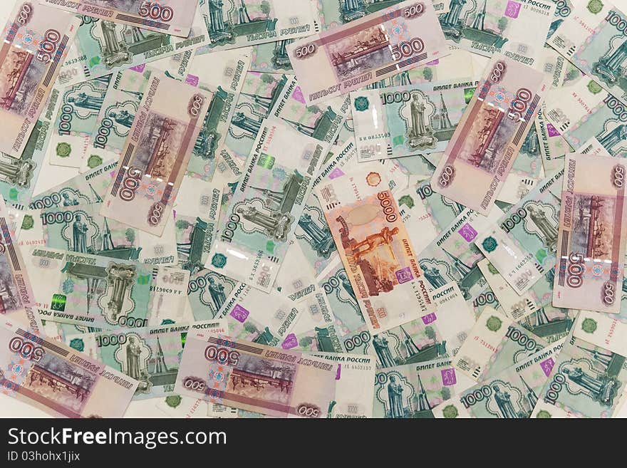 Money background. A lot of different rubles bills.