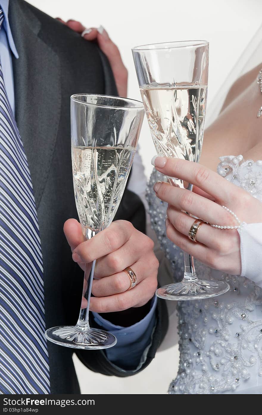 Happy bride and groom toasting with champagne. Happy bride and groom toasting with champagne