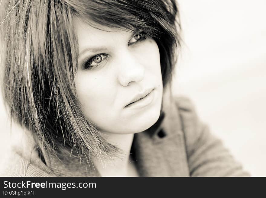 Rockabilly girl close-up toned portrait outdoors at a city. Rockabilly girl close-up toned portrait outdoors at a city