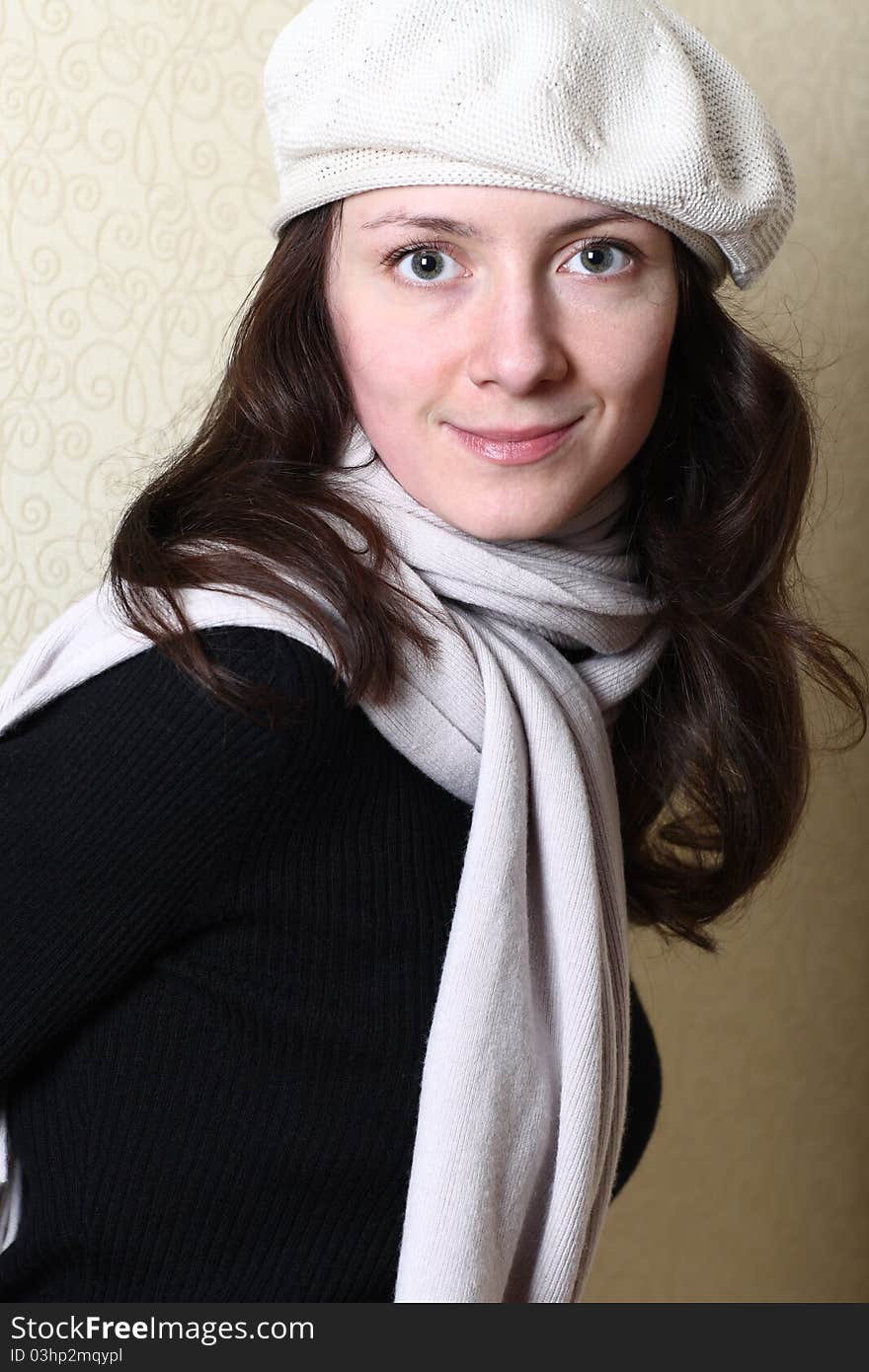 Studio portrait of a beautiful young woman wearing beret