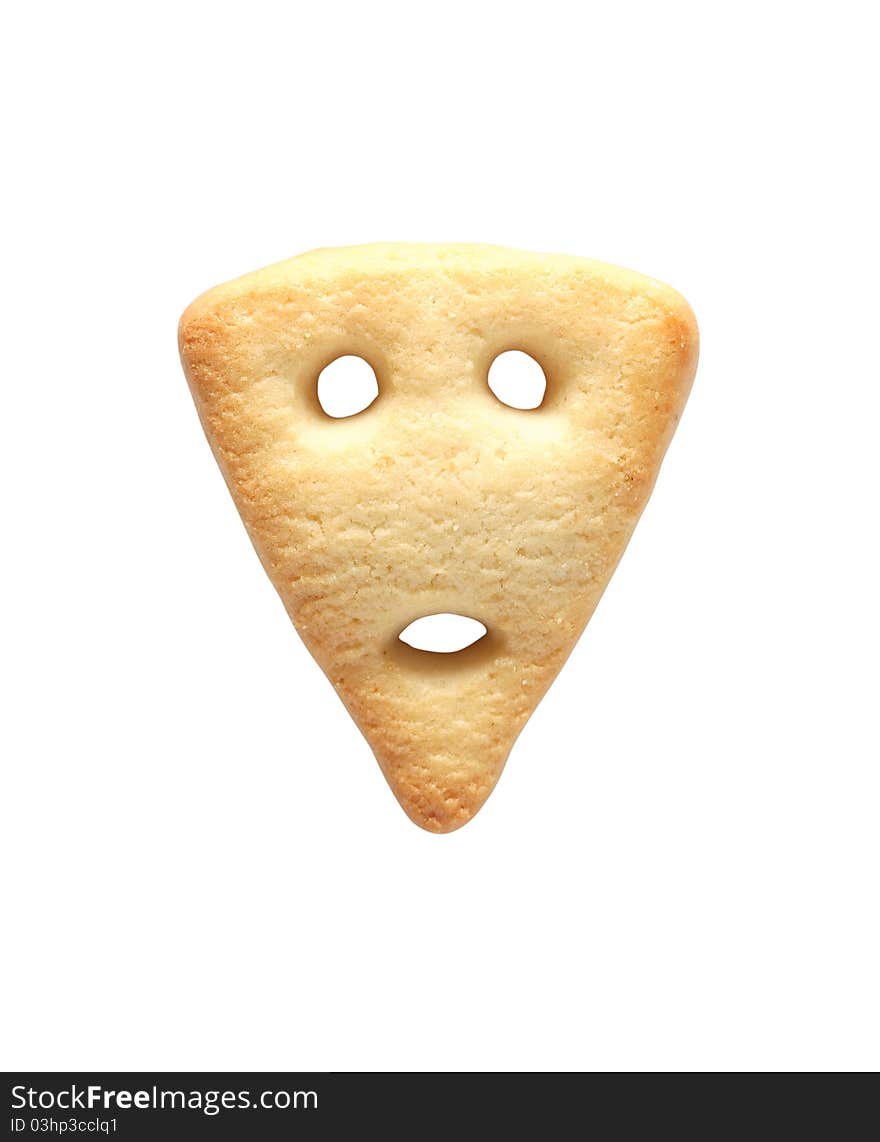 One triangle biscuit like a human face isolated on white background. Clipping path is included. One triangle biscuit like a human face isolated on white background. Clipping path is included