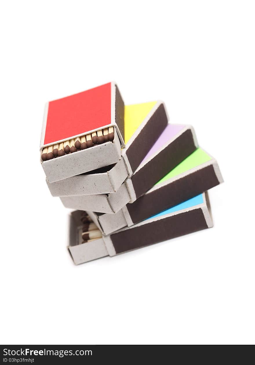 Stack of few open variegated matchboxes on white background. Stack of few open variegated matchboxes on white background