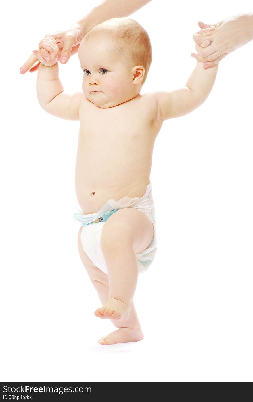 Standing baby isolated on white