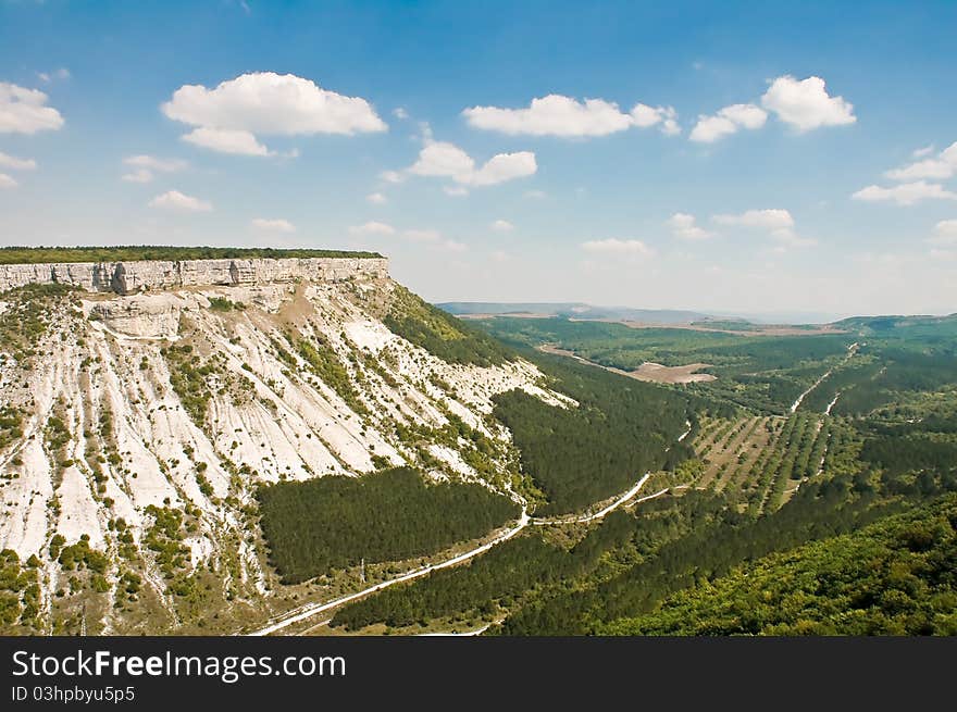 Beautiful landscape in Crimea mountain plateau and the valley with a road