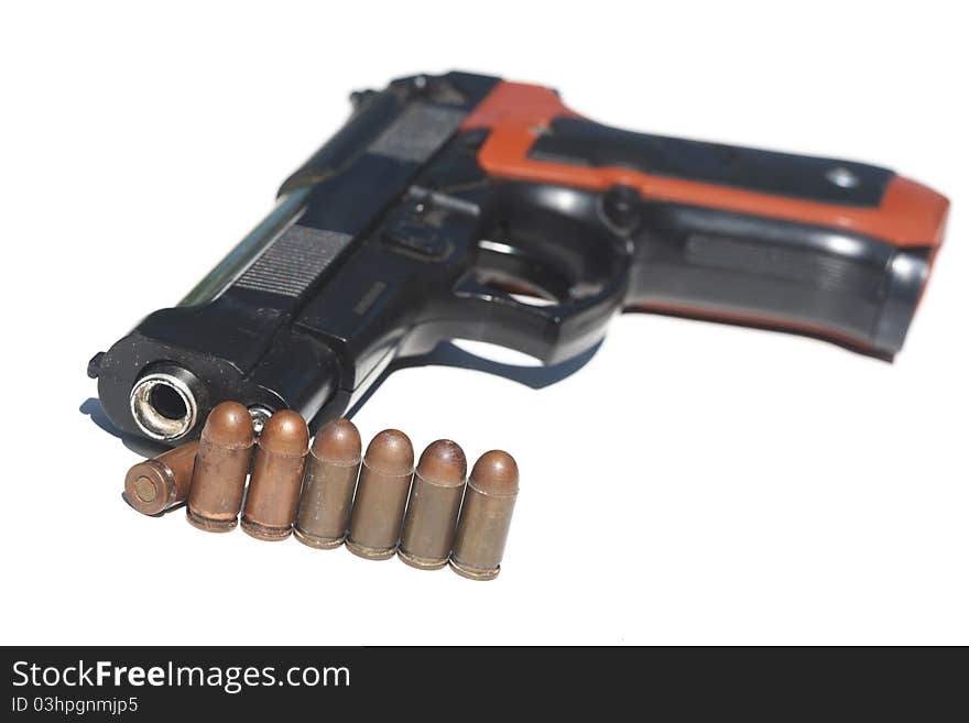 Pistol and ammunition on a white background