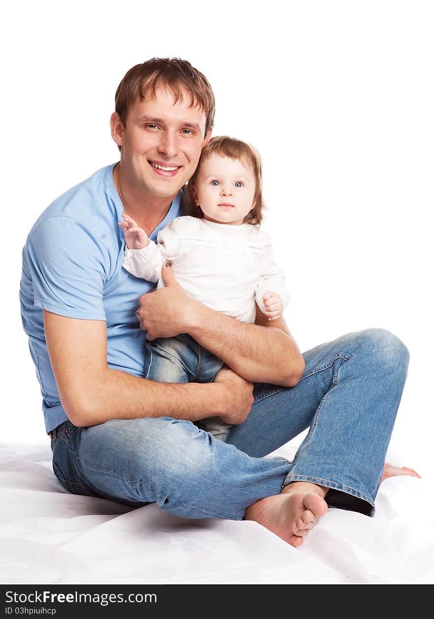 Happy family; young father and his daughter embracing and laughing. Happy family; young father and his daughter embracing and laughing