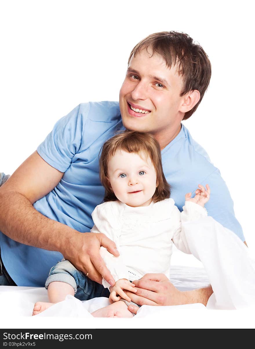 Happy family; young father and his daughter embracing and laughing. Happy family; young father and his daughter embracing and laughing