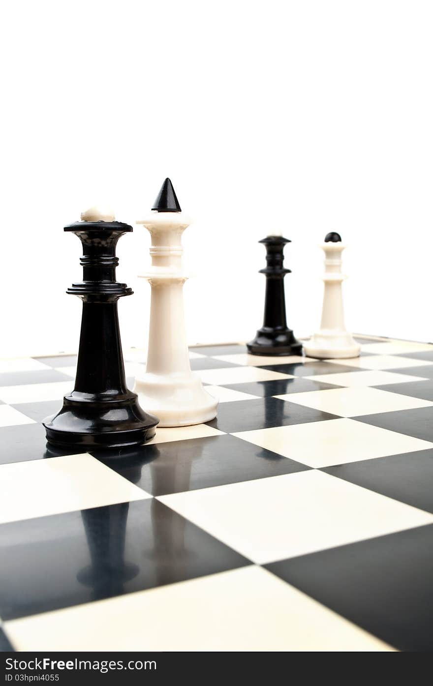 King and queen in chess isolated on a white background