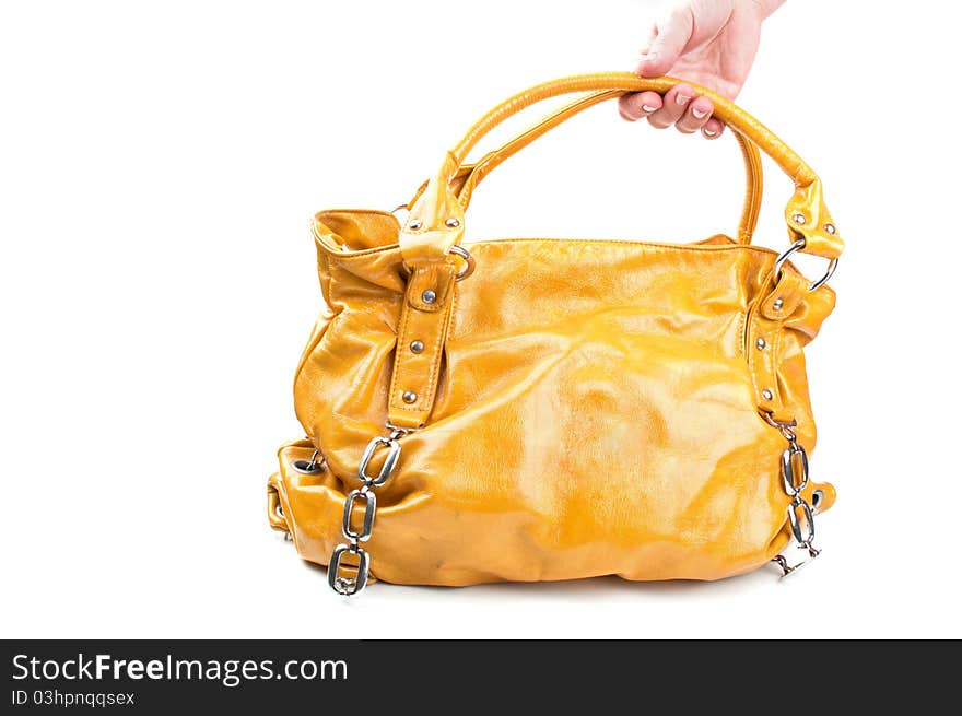 Fashion yellow bag isolated on a white background