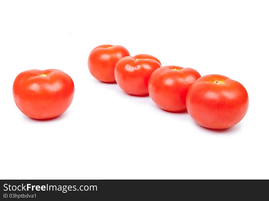 Some red tomatos in group isolated