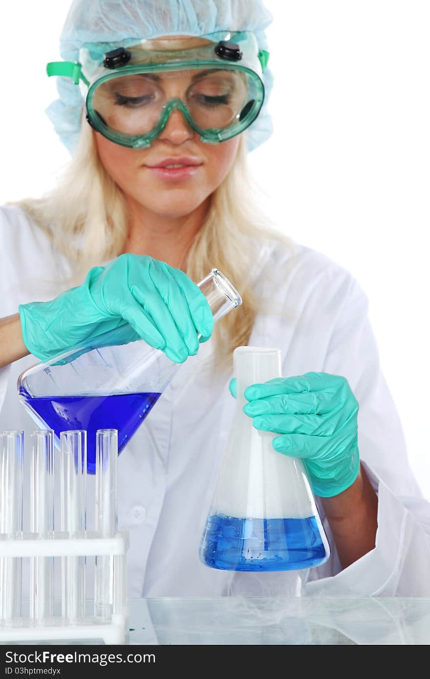 Woman conducting a chemical experiment