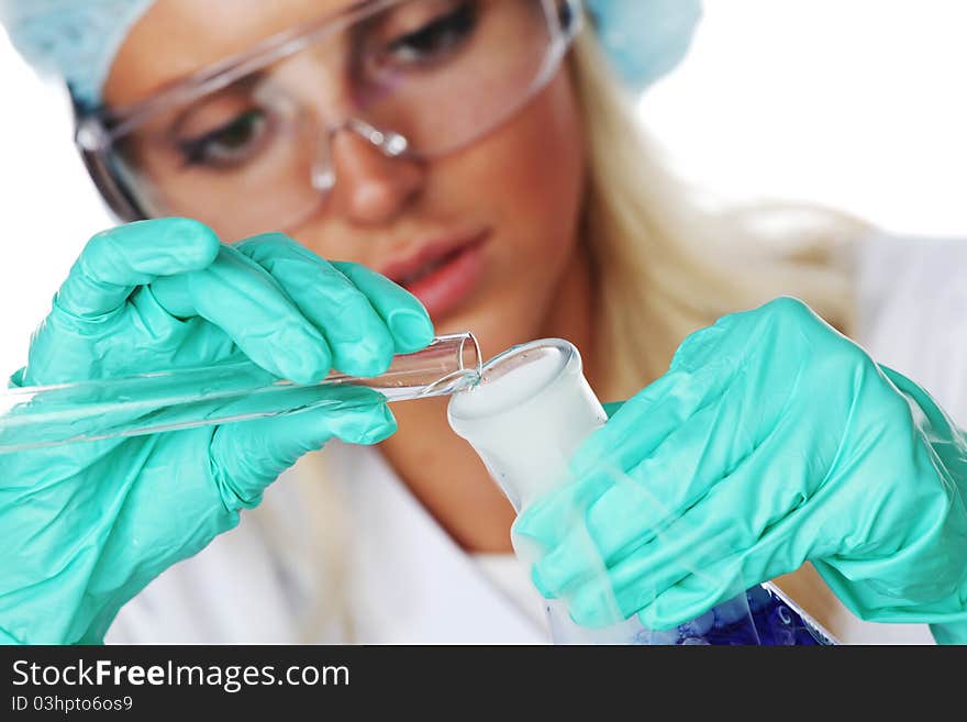 Woman conducting a chemical experiment