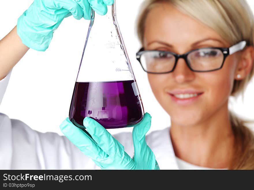 Woman conducting a chemical experiment