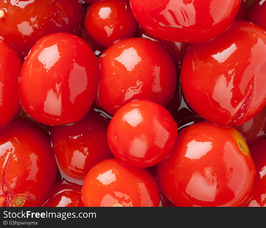 Background of pickled red tomatoes