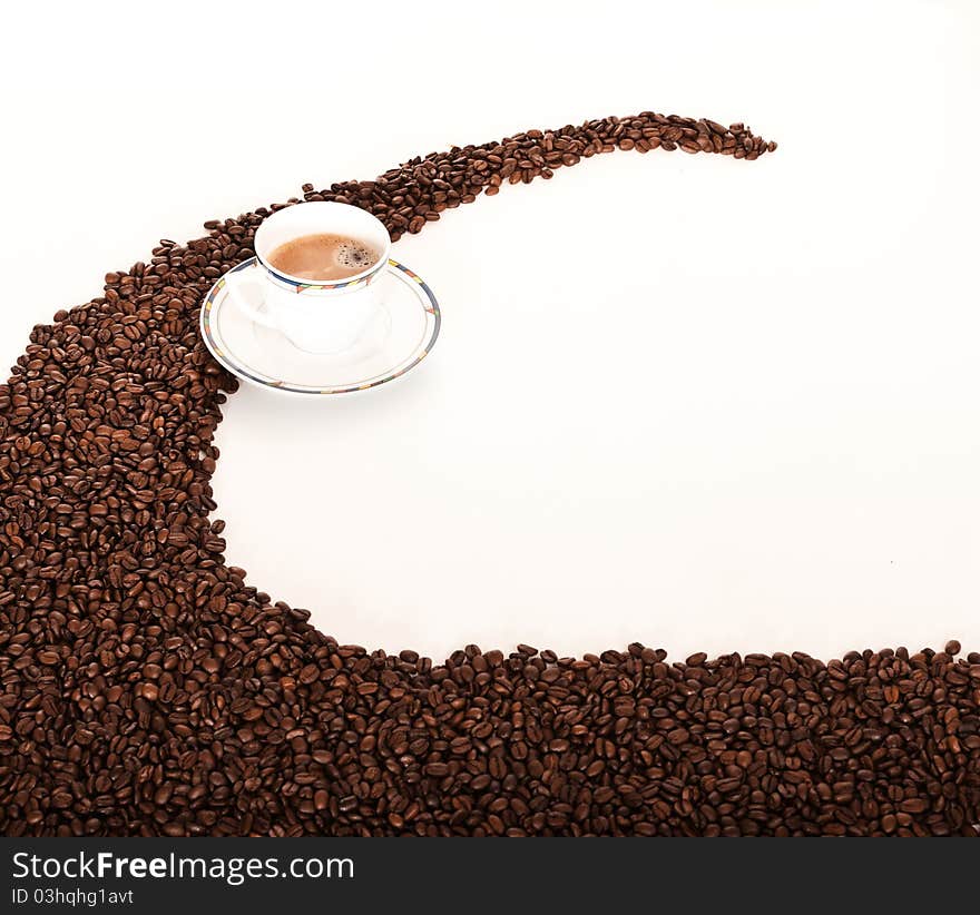 Coffe cup over coffee beans. Coffe cup over coffee beans