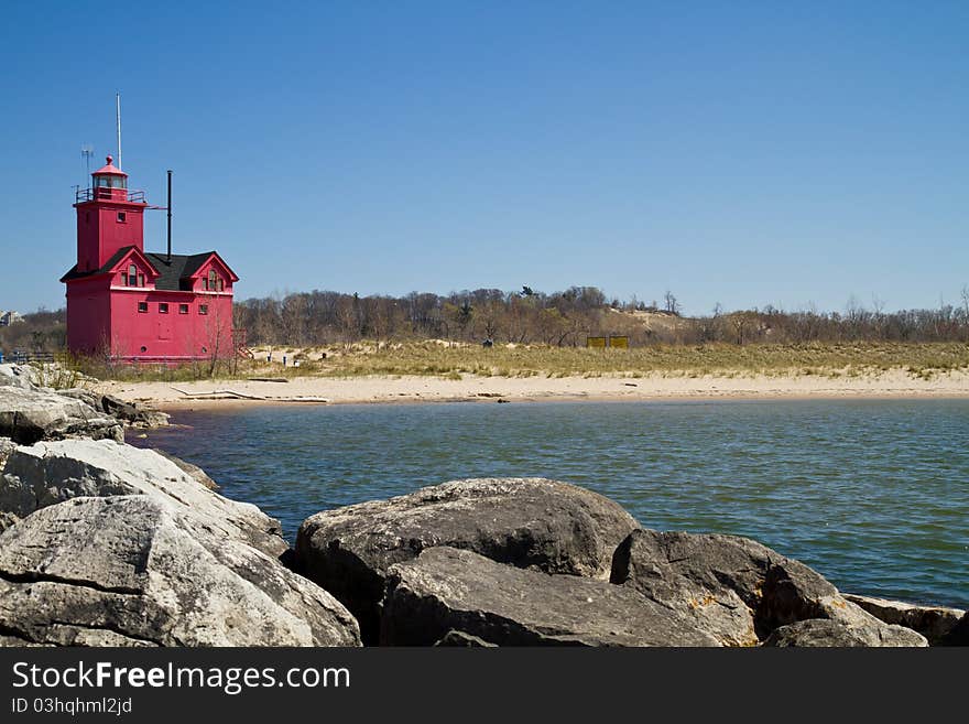 Red lighthouse on the coast of Lake Michigan. Red lighthouse on the coast of Lake Michigan