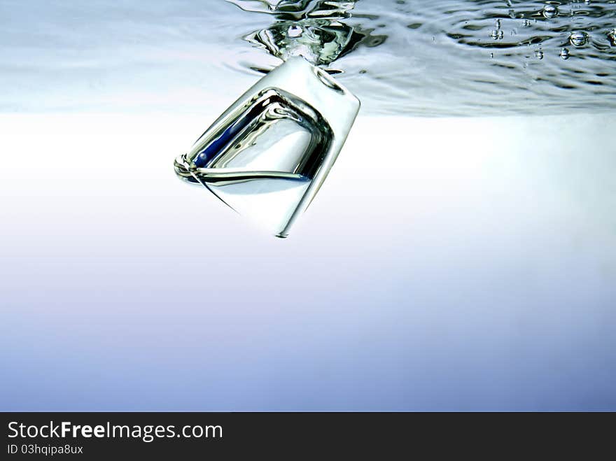 Glass falls into the water