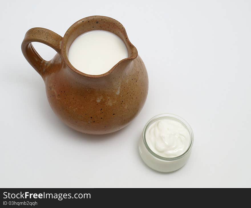 Jug of milk and yogurt.