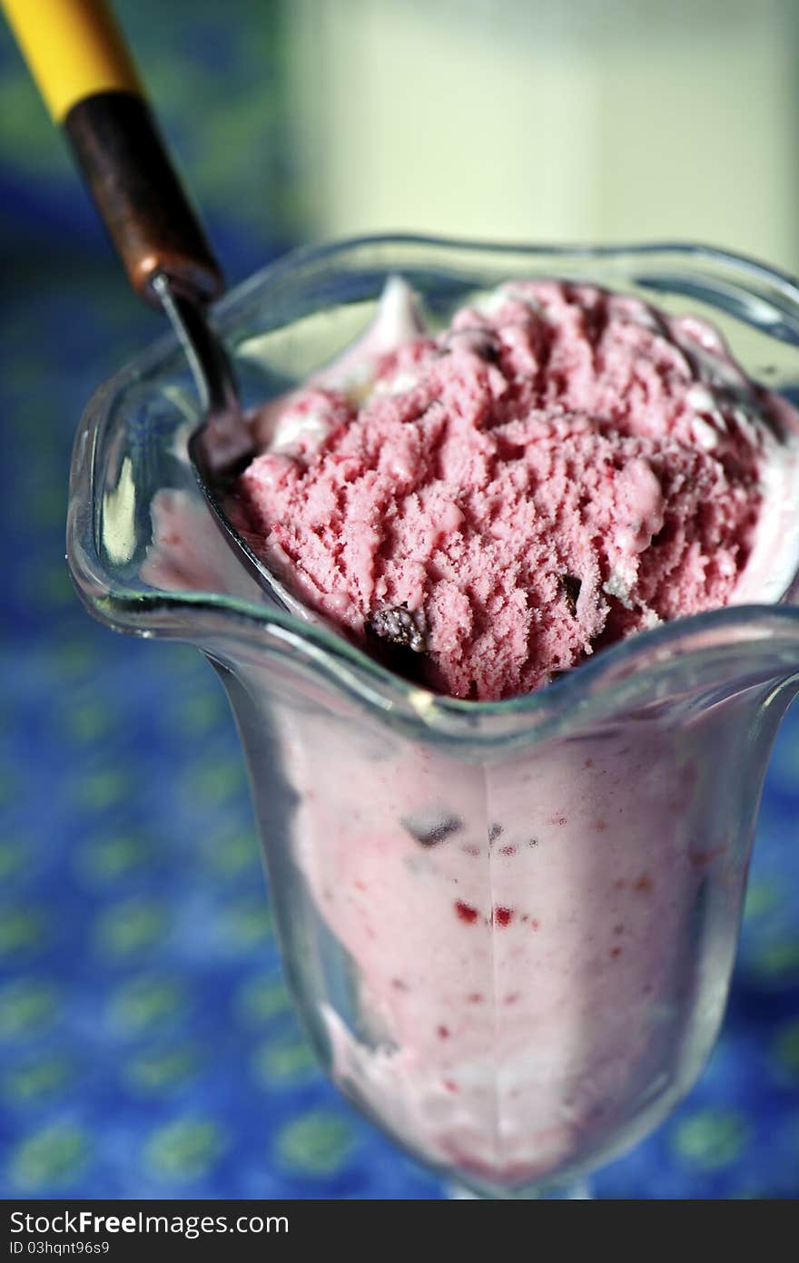 Close-up of strawberry ice-cream in a glass