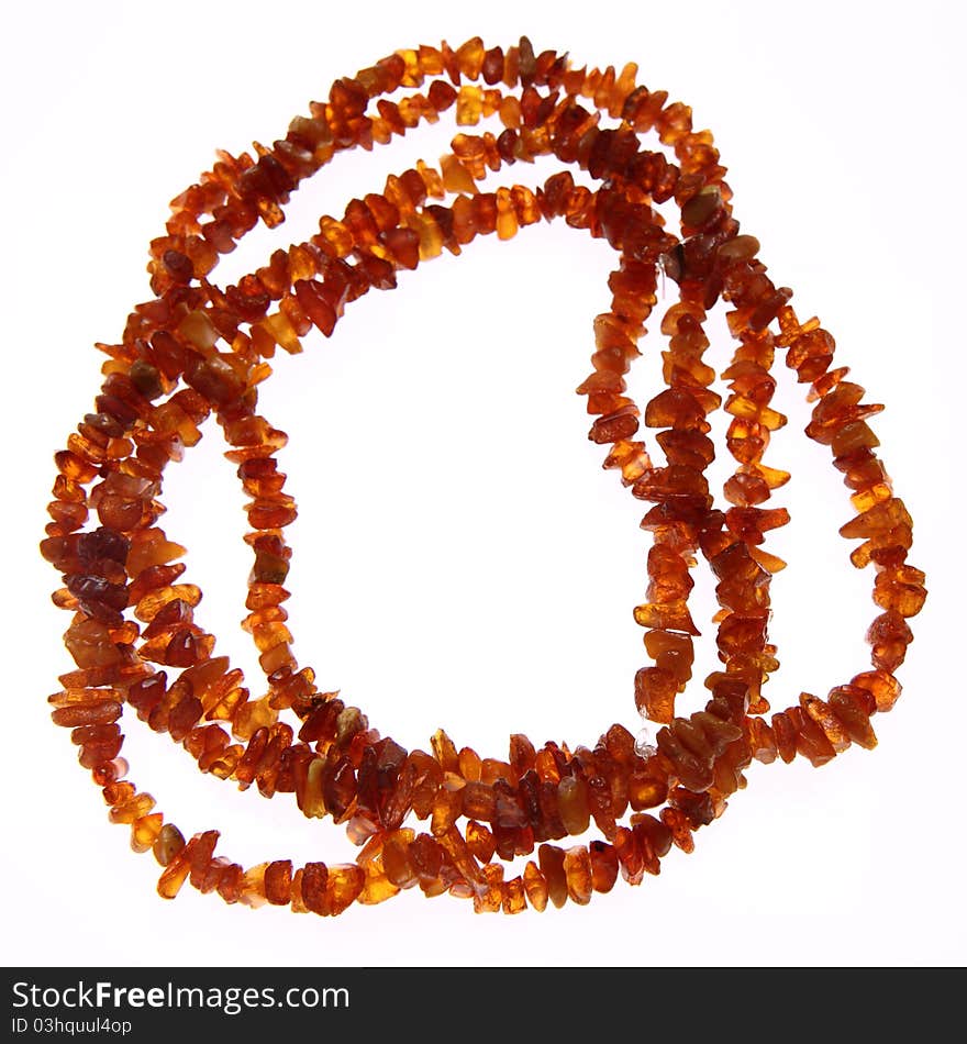 Amber necklace on white background