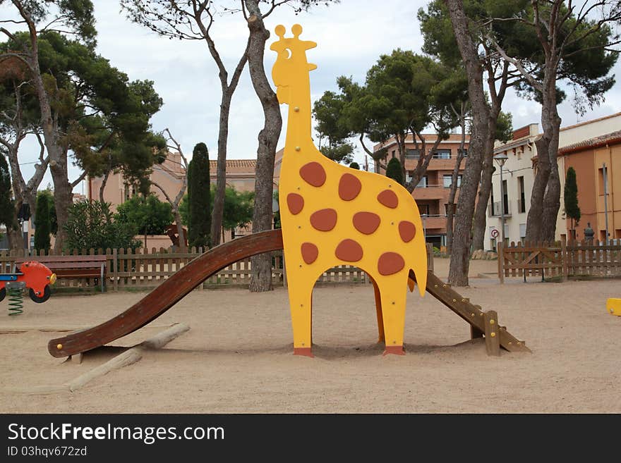 Giraffe in a playground in Girona. Giraffe in a playground in Girona