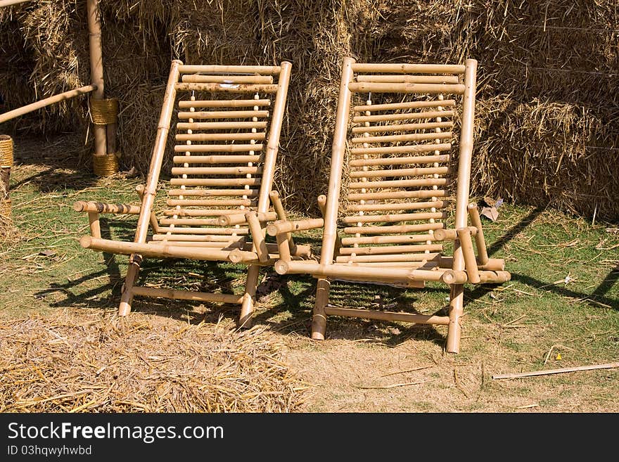 Two chairs by the beach shore in Thailand