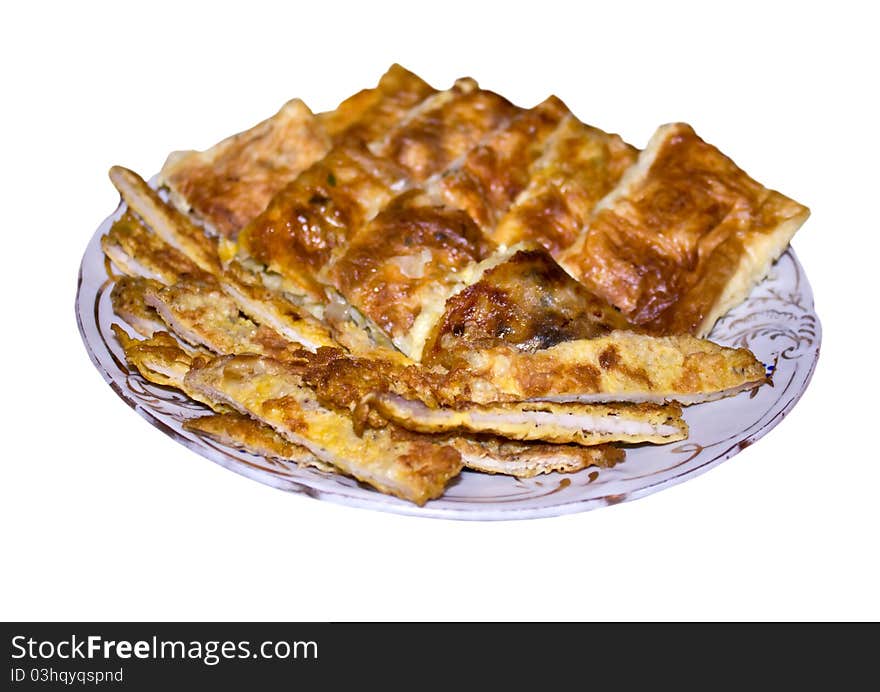 Tasty Pie on a plate isolated on a white background