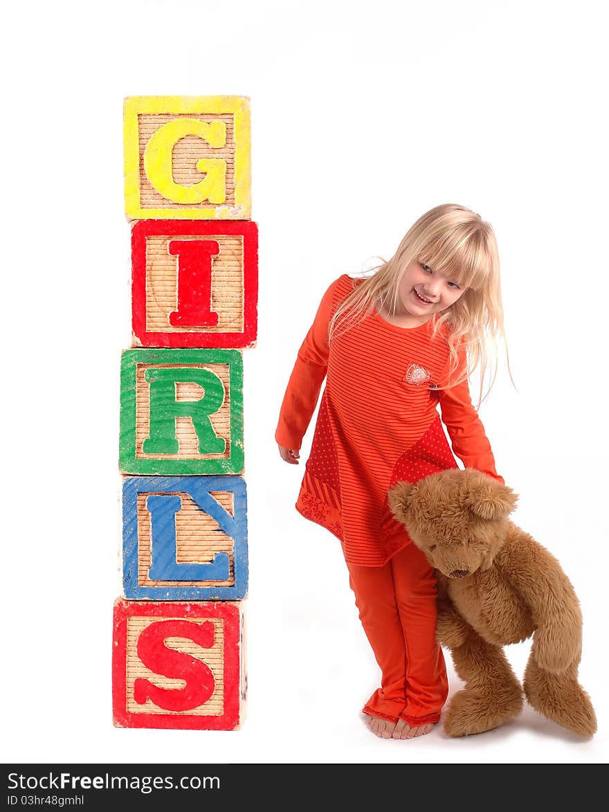 Elementary student with wooden blocks