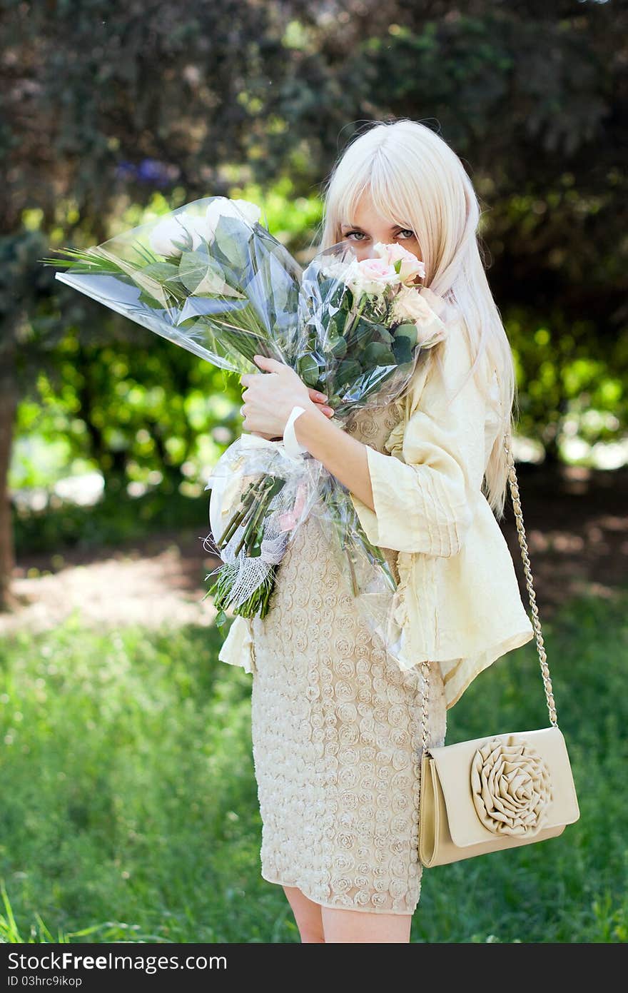 Portrait of beautiful girl with two bouquets. Portrait of beautiful girl with two bouquets