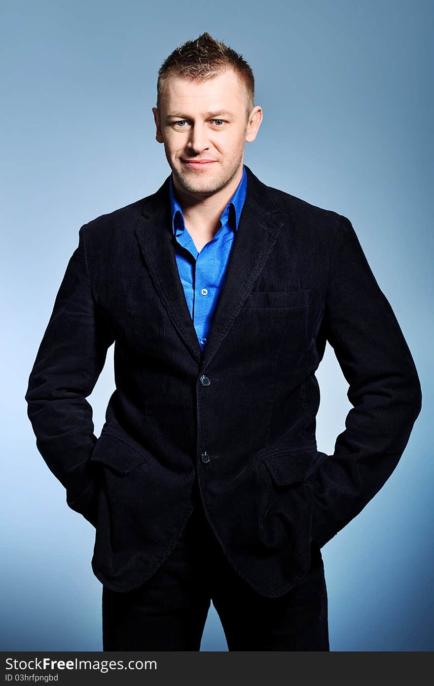 Portrait of a handsome man in a suit. Studio shot. Portrait of a handsome man in a suit. Studio shot.