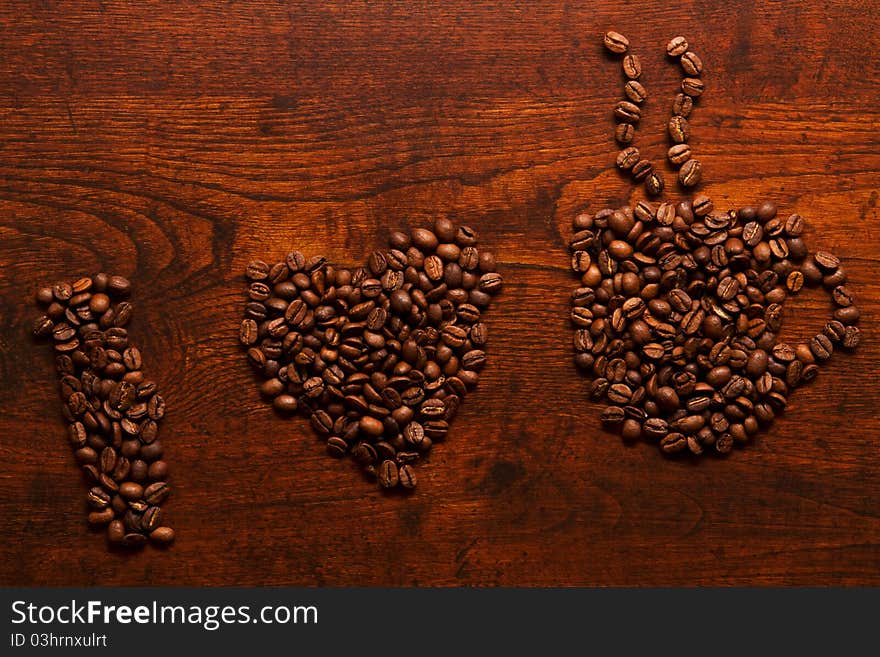 I love coffee inscription on the wooden table