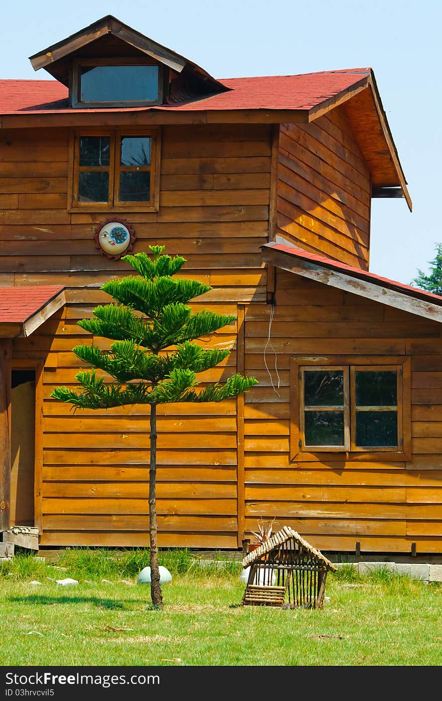 Country cottage house with a little stick house and tree. Country cottage house with a little stick house and tree