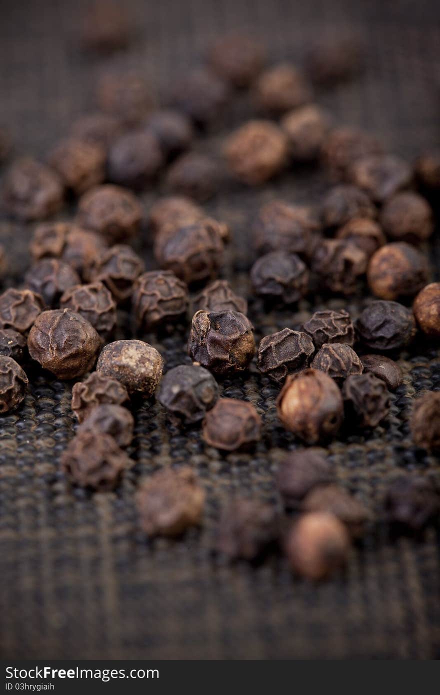 Black pepper on dark backround