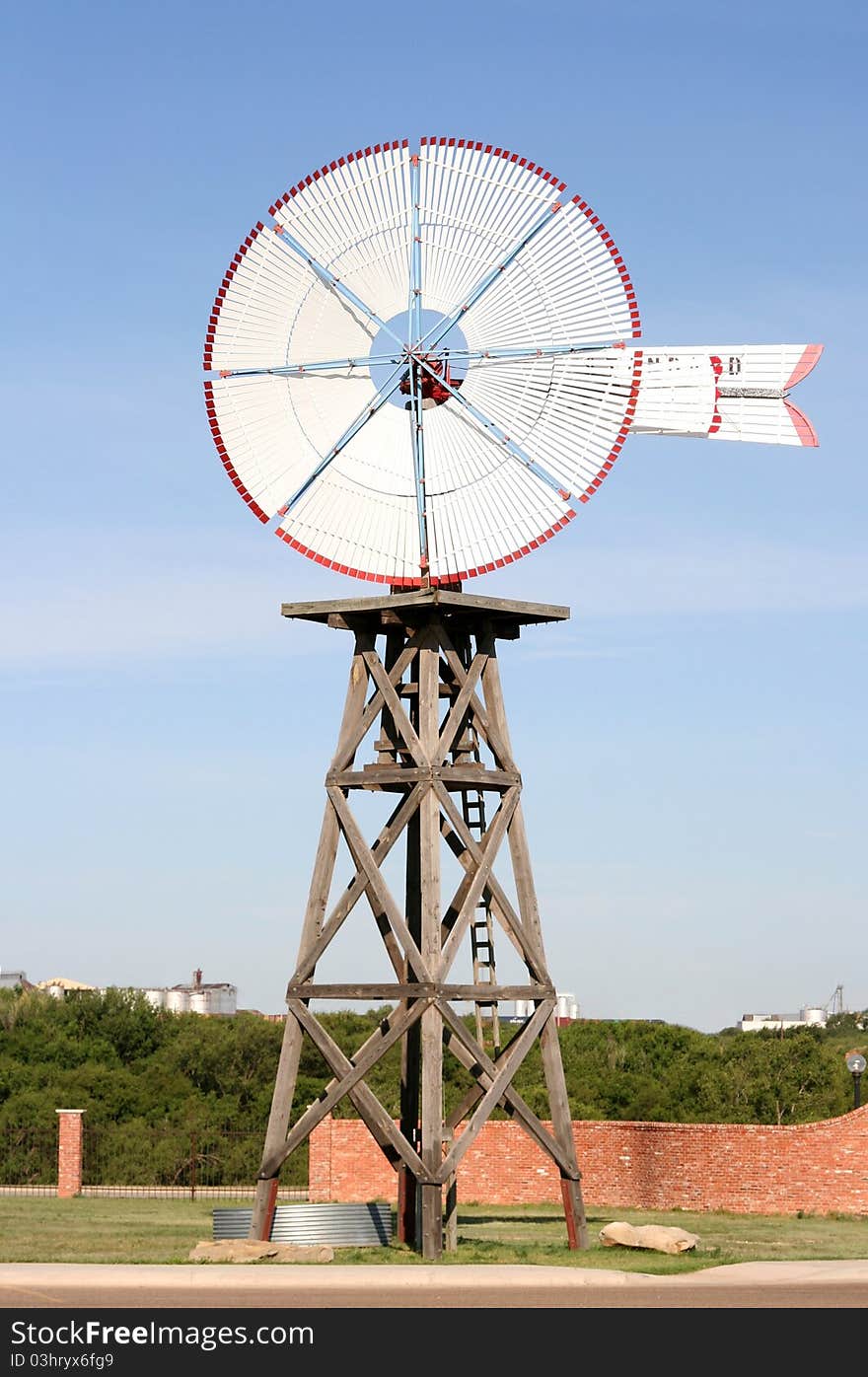 Large white and red old wind mill. Large white and red old wind mill