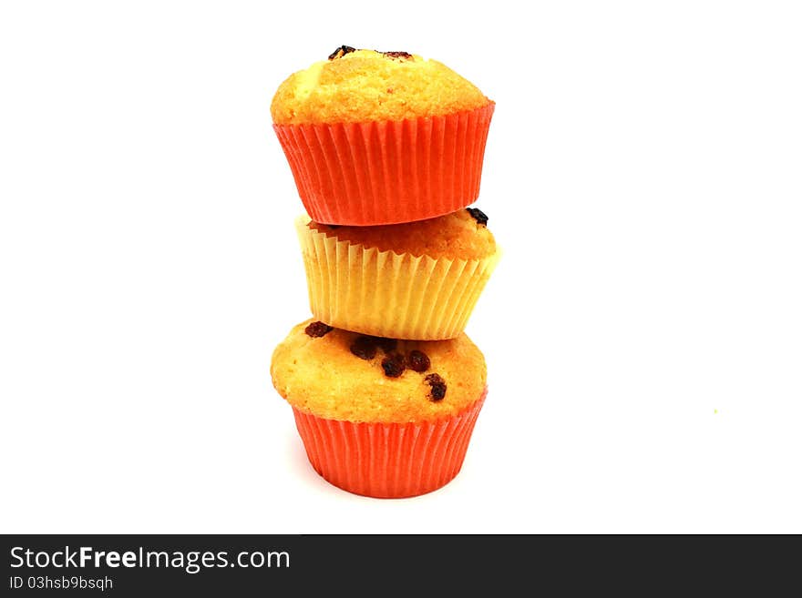 Tasty yellow three muffins on each other