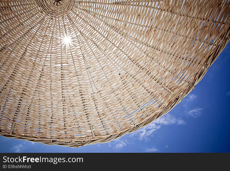 Straw beach umbrella.