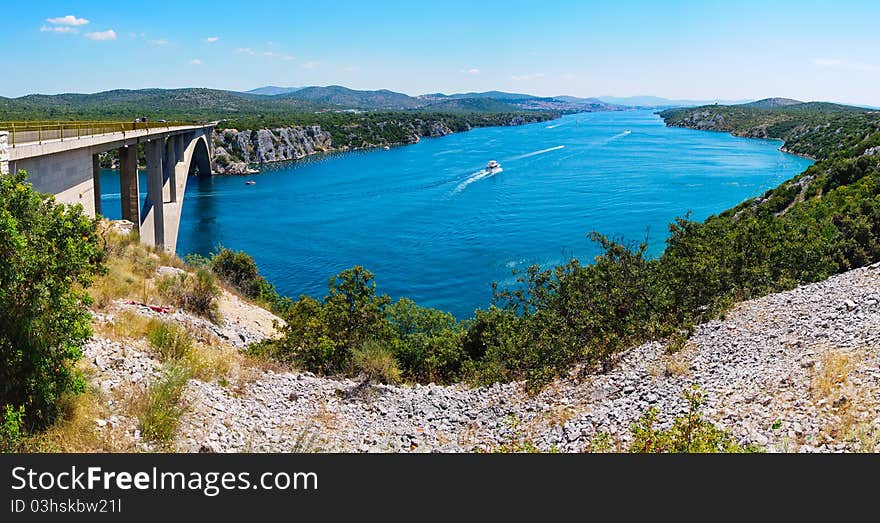 River Krka and bridge in Croatia - travel background. Panorama