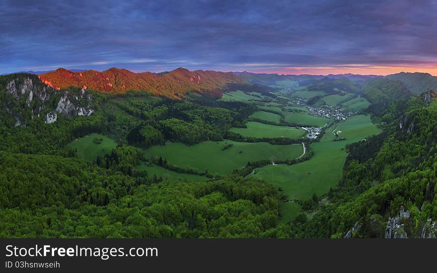 Dramatic sunset in summer mountain