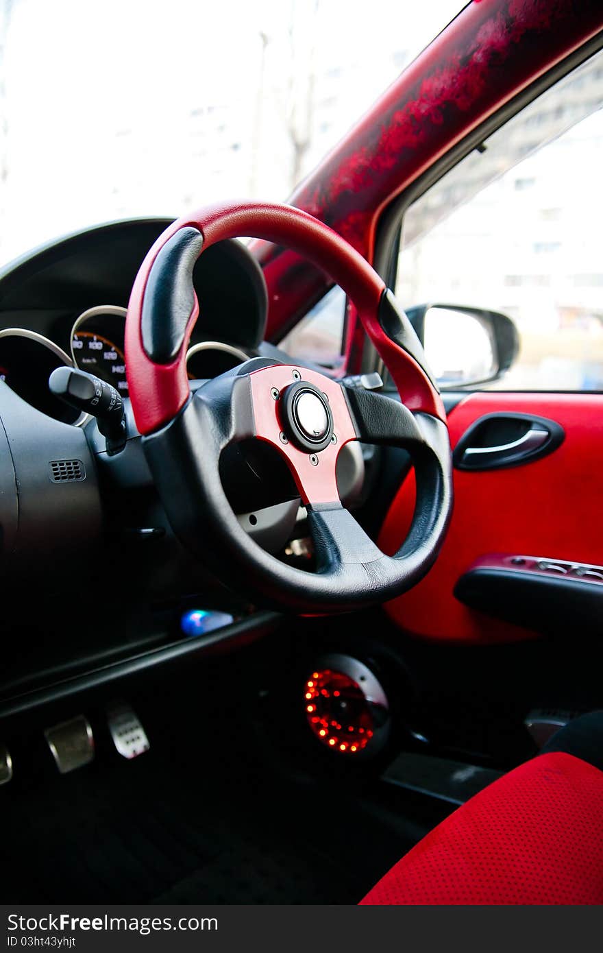 Details of the interior red car. Details of the interior red car