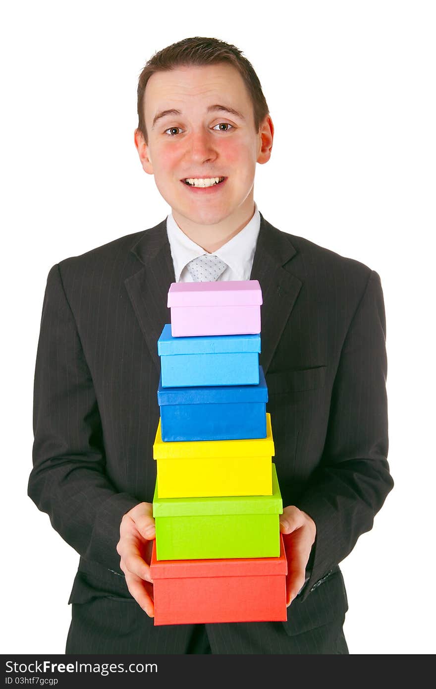 Young businessman with gift boxes