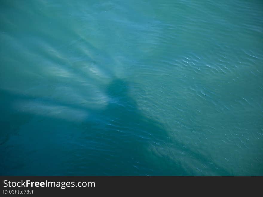 Shadow picture of a man on a boat